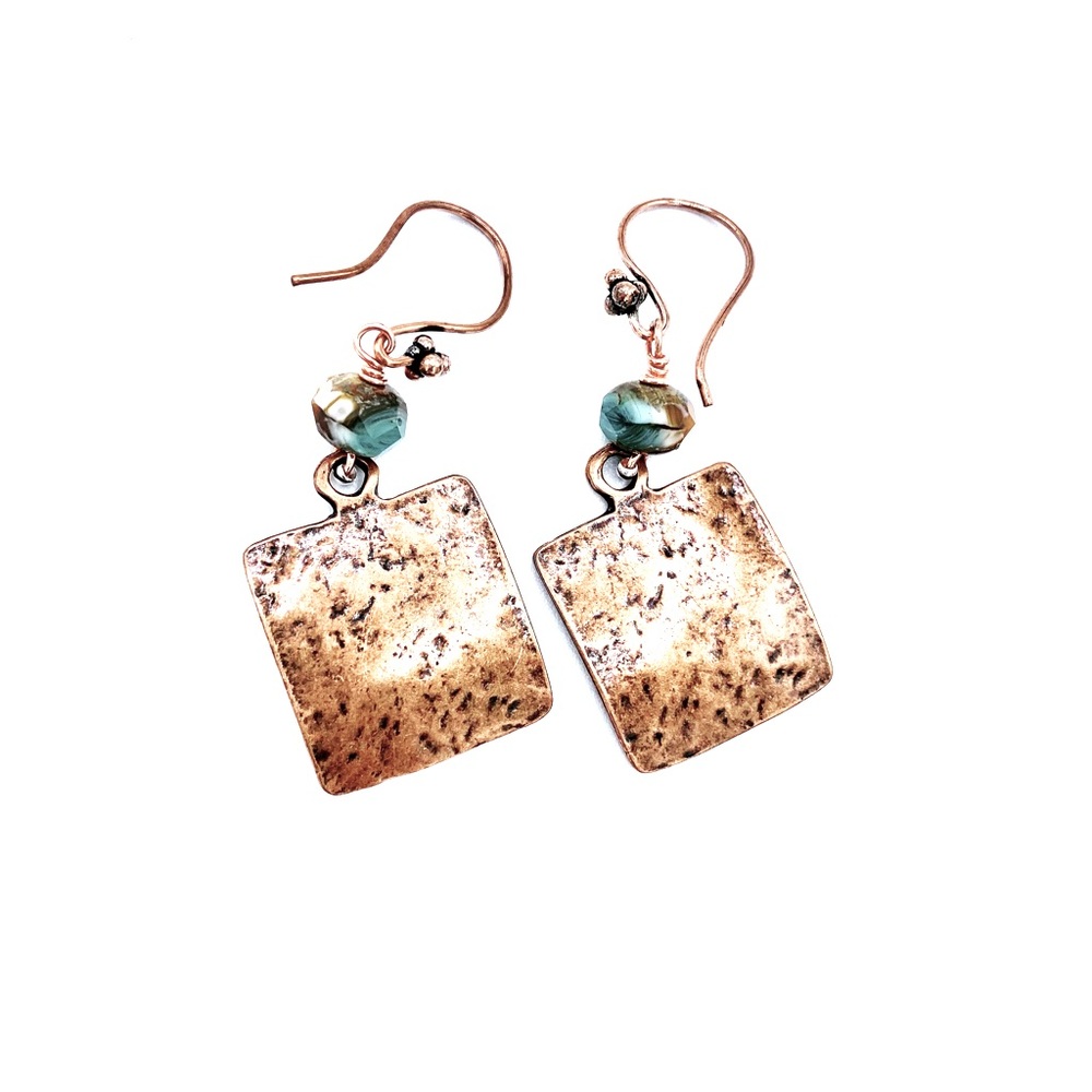Copper alloy adorned with a Czech Glass bead and a copper earring clasp